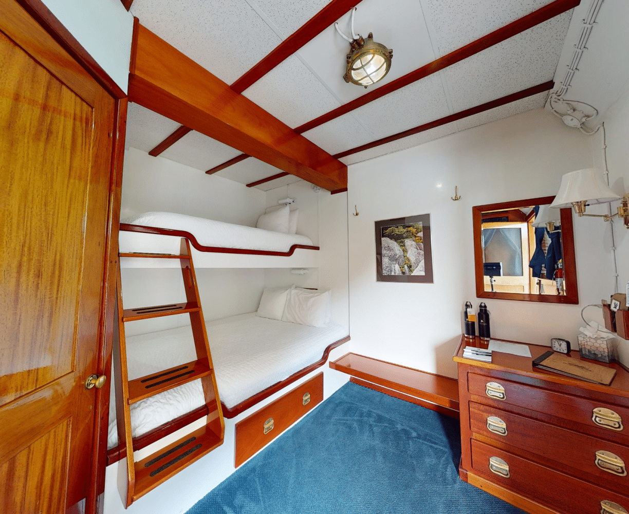 Stateroom on Main Deck with queen-sized bed plus upper twin bunk-[MDQ]